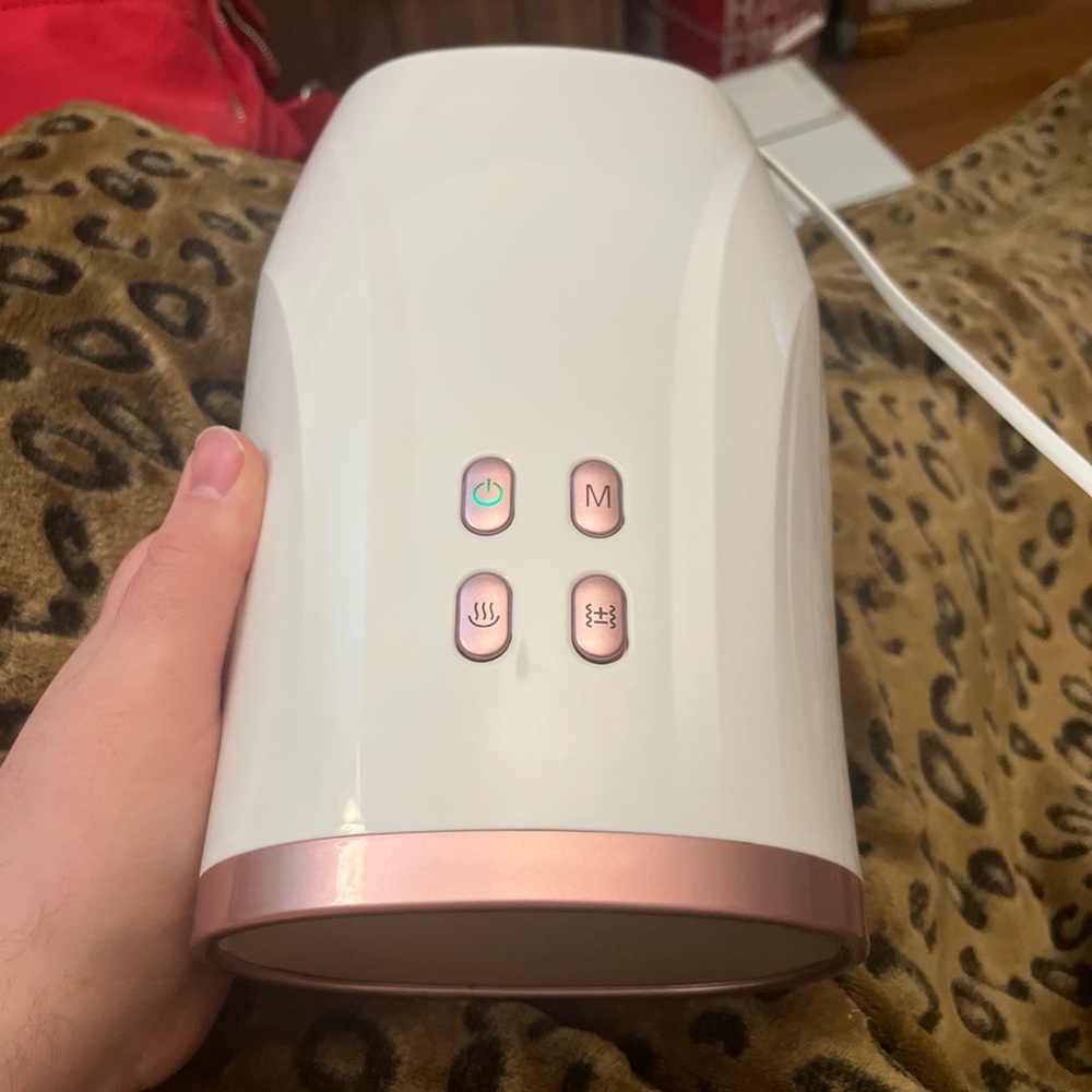White and Pink Hand Massager